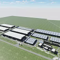 Large Industrial Factory Complex With Multiple Buildings And Open Green Fields