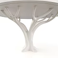 White Tree Trunk Shaped Pillar Supporting Modern Round Tabletop Design