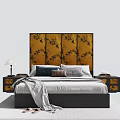 Double Bed With Yellow Headboard Black Floral Patterns Nightstands Table Lamp Pillows And Blanket
