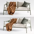 Minimalist Light Green Two Seater Sofa With Linen Upholstery White Cushions Gray Pillows And Brown Blanket