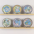 Decorative Colorful Circular Plates With Cartoon Patterns Arranged On Two Wooden Shelves