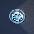 Silver Metal Sink Drain Cover With Multiple Holes And Central Knob