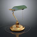 Elegant Table Lamp With Green Lampshade And Gold Base On Black Background