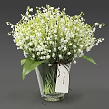 Transparent Vase With Lily of the Valley Flowers Brown Ribbon And Love Tag Decoration