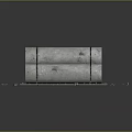 Concrete Pipes Bound With Black Straps Stacked On Black Platform With Gravel Scattered Around