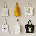 Colorful Tote Bags Hanging On Wall With Cartoon Bear Star And Girl Patterns