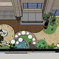 Courtyard Garden Featuring Two White Rabbit Sculptures Green Plants Wooden Shelf and Outdoor Table Chairs