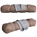 Brown Upholstered Sofa Bench with Tufted Design and Gray Blanket Draped