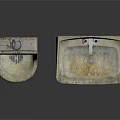 Old Rusty Urinal and Sink Bathroom Fixtures with Worn Surfaces