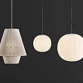 Modern Pendant Lights With Various Designs And White Shades Hanging On Dark Background