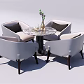Modern Round Marble Table With Four White Upholstered Chairs And Decorative Vase With Green Plants