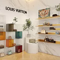 Louis Vuitton Interior Featuring White Marble Walls Colorful Glass Cabinets Golden Shelves Bags Green Plants