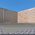 Modern Office Complex With Geometric White Orange Facades Central Courtyard Green Lawn And Blue Sky