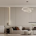 Modern Living and Dining Room with Beige Sofa Spiral Pendant Light in Neutral Tones