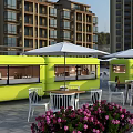Green Food Truck In Outdoor Dining Area With White Tables Chairs Umbrellas And Menu Board