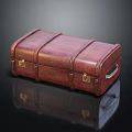 Vintage Red Leather Trunk With Metal Buckles Handle And Shiny Surface