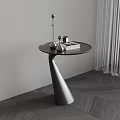 Modern Metal Side Table With Round Top Conical Base And Lamp On Wooden Floor
