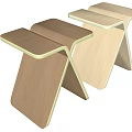 Two Modern Wooden Stools With Cross Legged Structure And Wood Tones