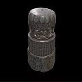 Ancient Stone Carved Pillar With Intricate Reliefs And Hieroglyphic Inscriptions