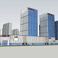 Modern Commercial Complex With High Rise Glass Buildings And Shopping Plaza Area