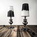 Modern Table Lamps With Black And White Gradient Shades And Metal Bases On Wooden Floor