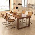 Modern Dining Room Interior Featuring Wooden Table Rattan Seats Chairs And White Cabinets
