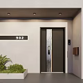Modern Exterior Entrance With Black Marble Door House Number 802 Light Wall And Green Plants