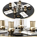 Elegant Black Round Dining Table Setup With Golden Vases Glassware And Napkins