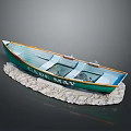 Green and White Cape Bay Model Boat Placed on Rock Base