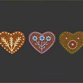 Heart Shaped Gingerbread Cookies Decorated With White Icing And Floral Patterns