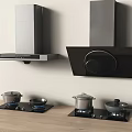 Modern Kitchen Appliances Featuring Silver Black Range Hoods and Gas Stoves with Pots on Burners