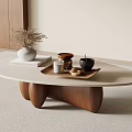 Modern Coffee Table with Light Top and Wooden Legs Featuring Vase Tray Mugs and Decor