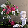 Colorful Floral Arrangement in Glass Vase with Pink Roses White Flowers and White Sculpture