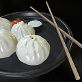 Delicious Steamed Buns on Black Plate with Red and White Sauces and Chopsticks