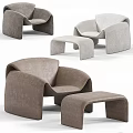 Modern Beige Upholstered Leisure Chair With Curved Design And Matching Ottoman