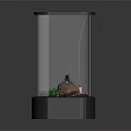 Small Transparent Glass Terrarium With Green Plants Rocks Bubbles Black Base And Lid