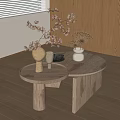 Modern Wooden Coffee Table Set With Decorative Vases Flowers And Small Plate Near Wooden Cabinets
