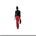 Stylish Woman In Black Turtleneck Top And Red Pants Carrying Black Briefcase