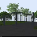 Metal Entrance Gate With Railing Design Surrounded by Green Trees and Paved Driveway