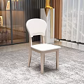 Modern Minimalist Dining Chair With White Padded Backrest And Light Wood Legs In Elegant Interior