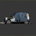 Old Abandoned Car With Damaged Body Covered In Blue And Brown Tarp On Gray Ground