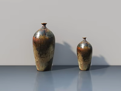 Large And Small Ceramic Vases With Brown Gold Gradient Textured Surface On Smooth Gray Tabletop 3d model
