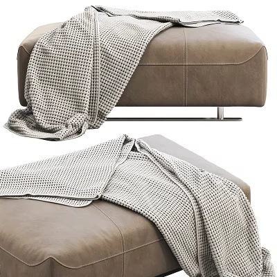 Brown Leather Ottoman With Gray Checkered Blanket Draped Over Top Surface 3d model
