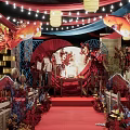 Elegant Traditional Chinese Wedding Banquet Hall Featuring Red Carpet Lanterns And Floral Decor