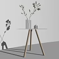 Modern Side Table with Metal Frame Glass Top and Vase of Flowers by Sofa