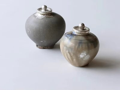 Two Handcrafted Ceramic Jars With Silver Lids Gray And Blue White Patterns 3d model