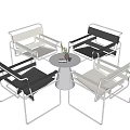 Modern Leisure Chairs With Black White Seats And Metal Frames Around Small Table