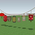 Colorful Traditional Lanterns Hanging On Rope Over Green Grass Field
