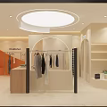Modern Clothing Store Interior With Mannequins Displaying Fashionable Apparel And Lighting