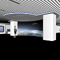 Modern Exhibition Hall Interior Featuring Display Screens People And Sleek Ceiling Design
